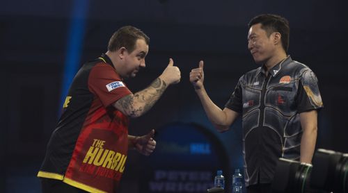 Kim Huybrechts und Di Zhuang freundschaftlich