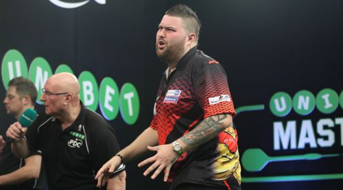 Michael Smith muss sich am ersten Spieltag des Masters geschlagen geben