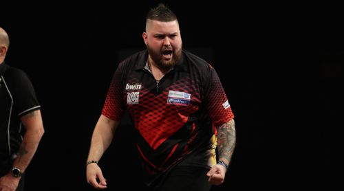 Michael Smith zieht mit Vollbart in das Achtelfinale des Grand Slam of Darts ein