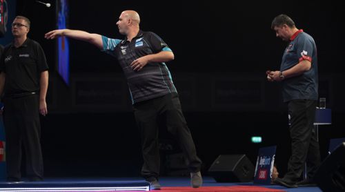 Rob Cross besiegte Mensur Suljovic