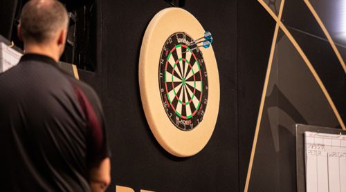 Darts im Dartboard